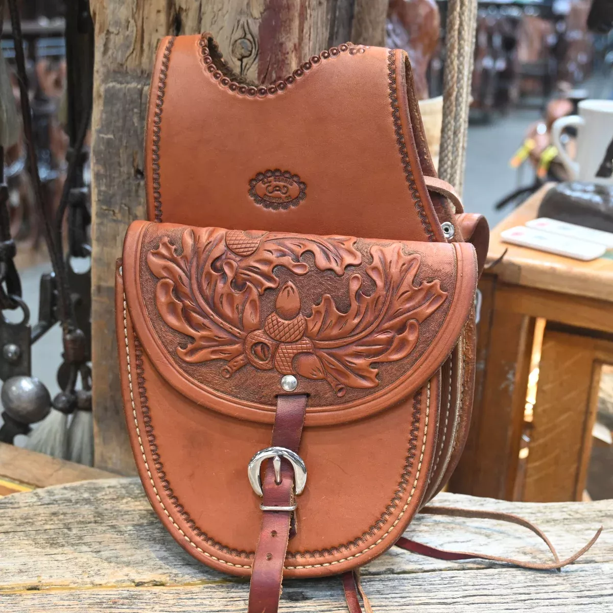 C. L. Dennis Tooled Leather Pommal Bags