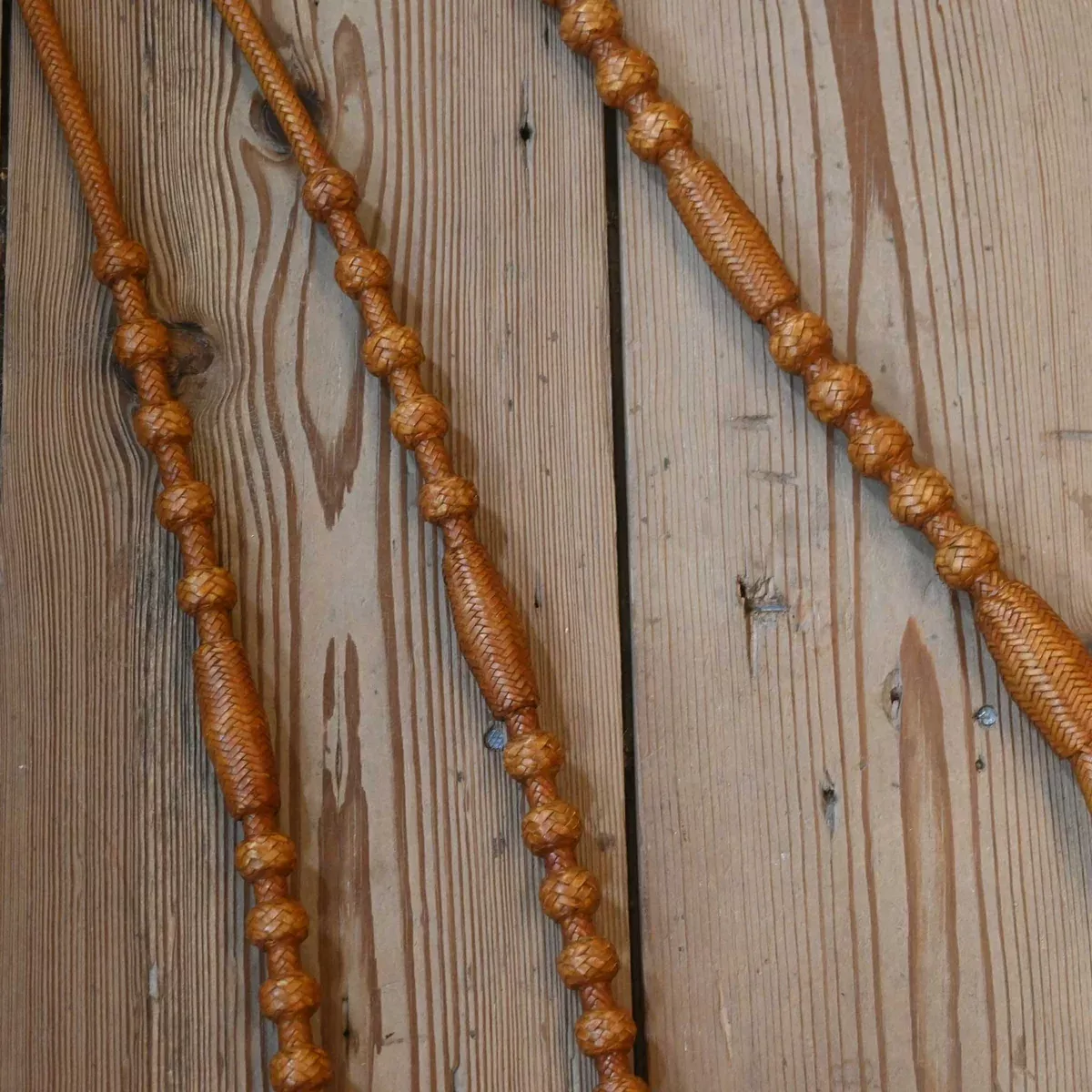 Hand Braided 102" Rawhide Romel Reins
