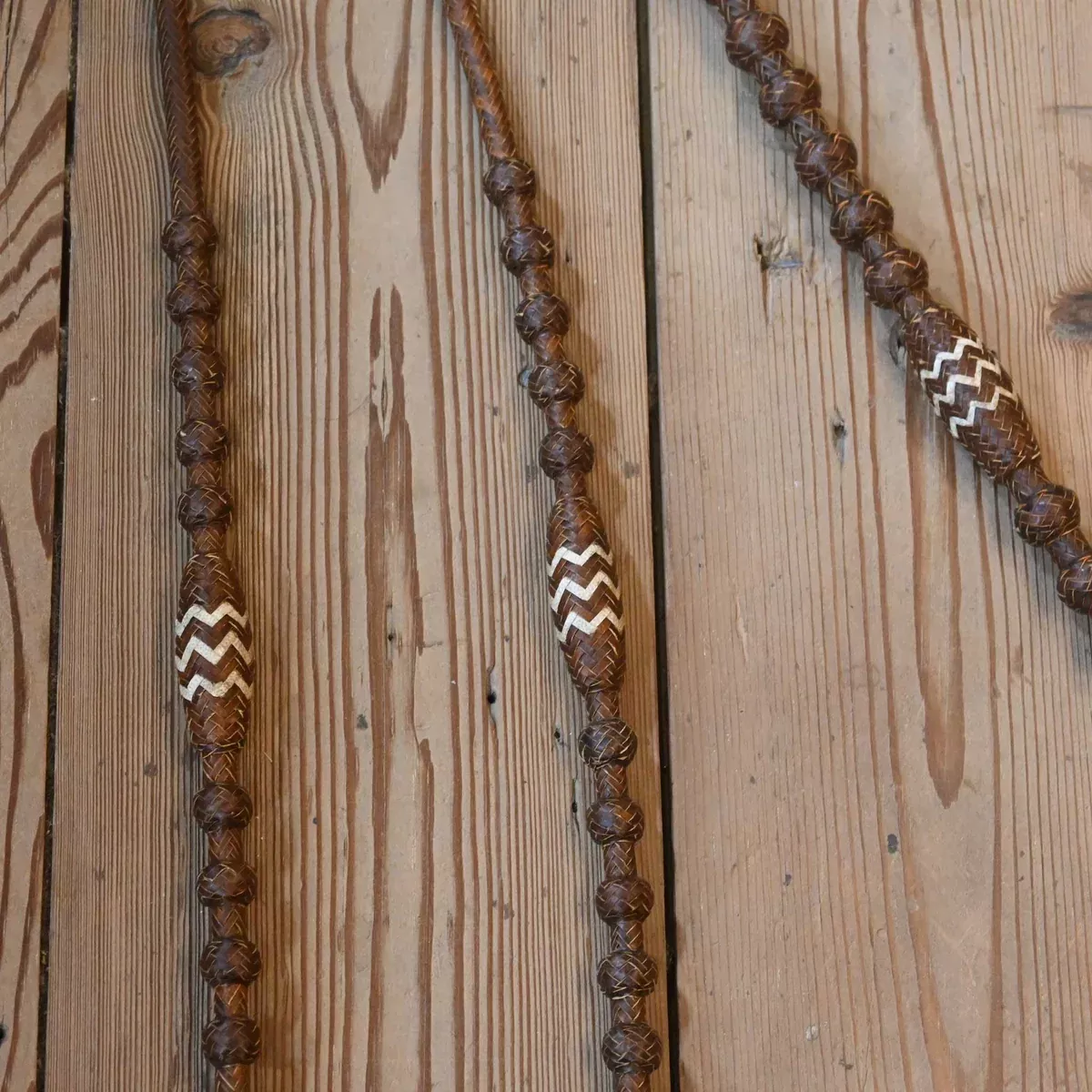 Hand Braided 110" Rawhide Romel Reins