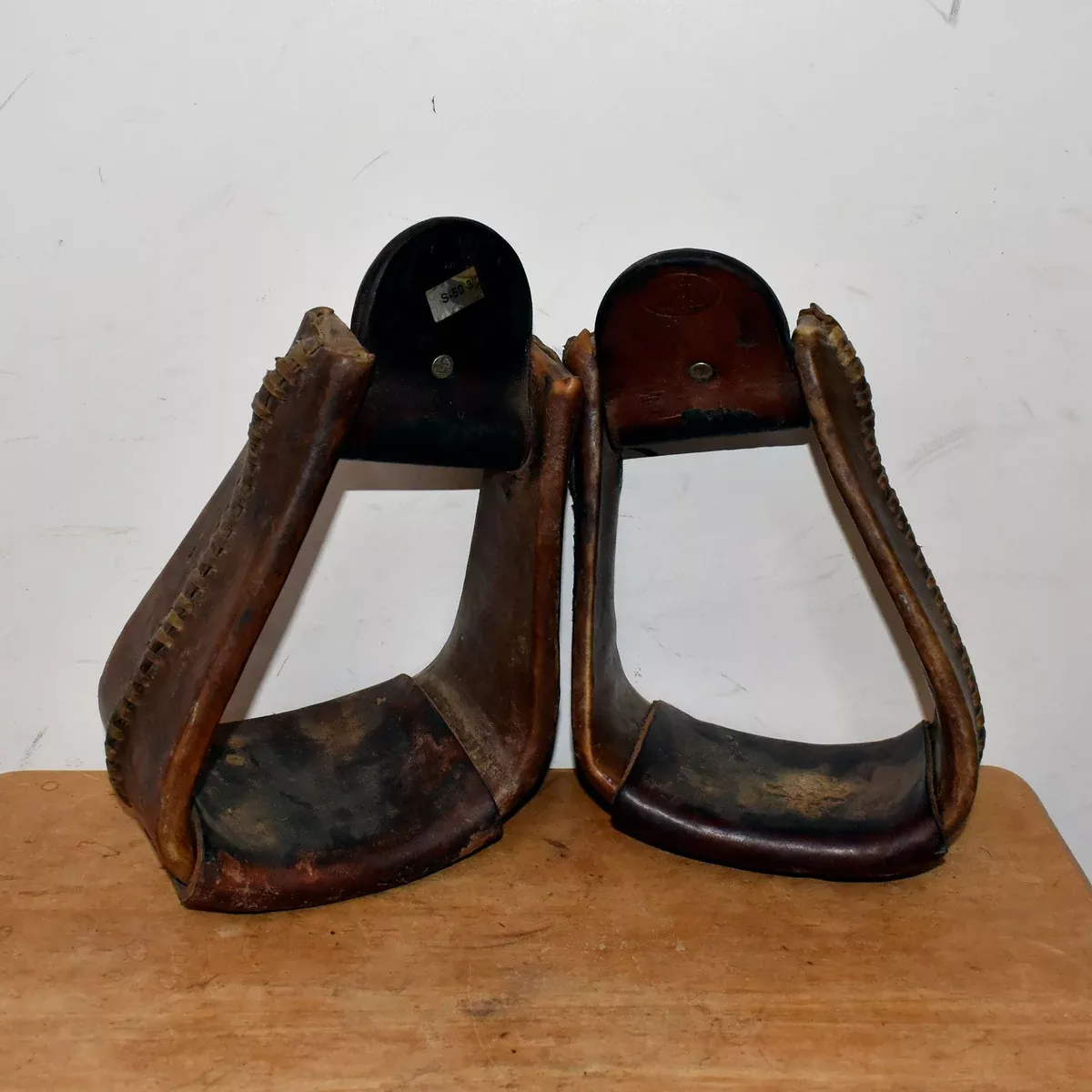 Used 3" Rawhide Covered Crooked Stirrups