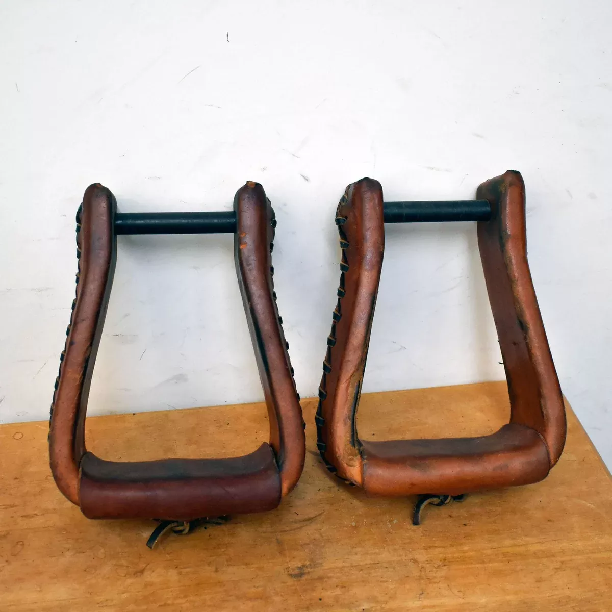 Used Leather Covered Wooden Roping Stirrups